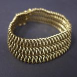 A vintage 9ct yellow gold bracelet composed of 3 interlinked rows, L: 18cm,