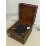 An early 20th century oak cased Victrola with Bakelite fittings