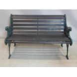 A cream painted wrought iron bench, H.75 W.118 D.67cm