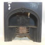 A Victorian cast metal fireplace