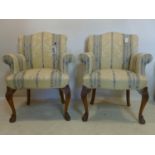 WITHDRAWN- A pair of Queen Anne style armchairs raised on carved cabriole legs