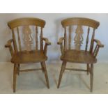 WITHDRAWN- A pair of 20th century pine armchairs stamped Mundus
