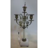 An Empire style three branch four light marble and gilt metal candelabra, H.48cm