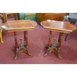 A pair of 20th century teak occasional tables, raised on turned supports on quadriform base with