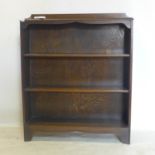 An early 20th century oak open bookcase with adjustable shelves, H.100 W.84 D.23cm