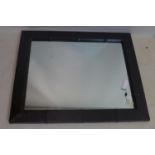 A large contemporary leather clad mirror, 110 x 91cm