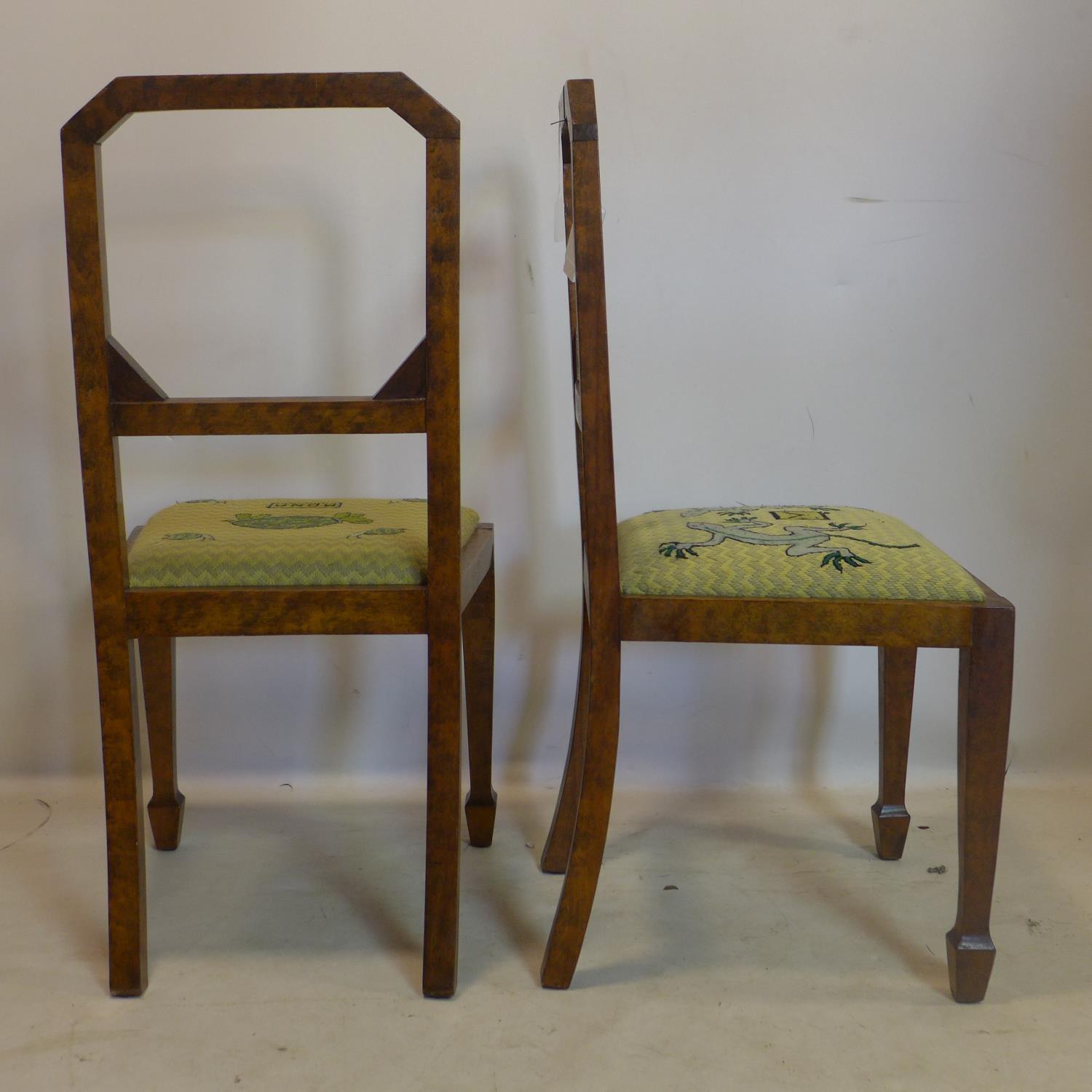 A set of four Art Deco burr walnut dining chairs, with inlaid square framed back rests, raised on - Image 4 of 4
