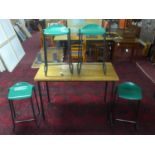A set of four green 'Metalliform' stools with teak top table, H.85 W.120 D.60cm