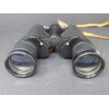 A pair of Hilkinson 12x50 wide angle field binoculars, No.501161, in case (handle to case broken)