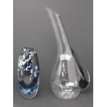 A glass vase/decanter with black handle, H.37cm, and an Art Glass vase with mottled decoration, H.