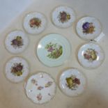 A set of 7 Furstenberg plates decorated with fruit, marked to reverse, (one plate cracked)