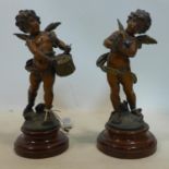 A pair of early 20th century French spelter statues of putti, H.35cm