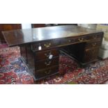 A large 20th century mahogany drop leaf partners desk, H.78 W.215 D.99cm