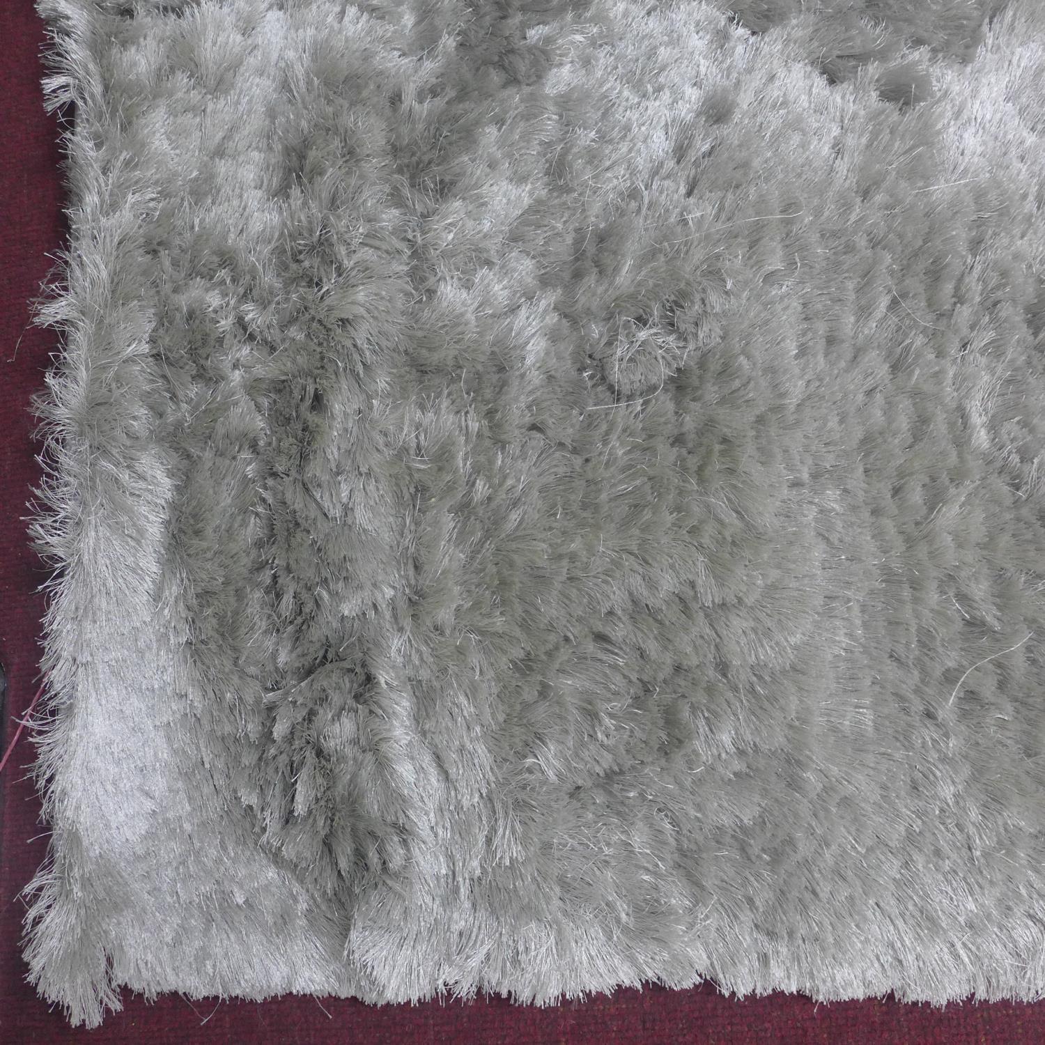 A contemporary hand made woolen carpet, 303 x 204cm - Image 3 of 8
