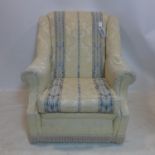A 20th century armchair with damask upholstery