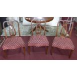 A set of 3 late 19th century mahogany dining chairs with lyre back rests