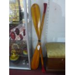 A vintage pair of wooden oars by Germina DDR, East Germany with red-painted wooden ends, Circa