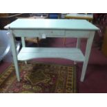 A green painted side table with single drawer, H.79 W.100 D.49cm