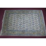 A 20th century signed Kirman carpet with English William Morris free spirit design, 335 x 220cm