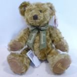 A Harrods 100th Anniversary teddy bear, H. 30cm, W. 25cm