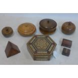 A collection of 8 wooden boxes of varying size and form, to include turned examples, a hexagonal