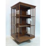 A large early 20th century mahogany revolving bookcase, H.114 W.59 D.59cm