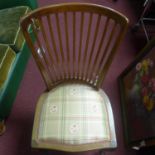 An Edwardian inlaid mahogany chair