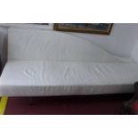 A contemporary white leather chaise longue, L.240cm
