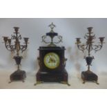 WITHDRAWN - A French black slate and variegated marble clock garniture, the Arabic dial signed Foui