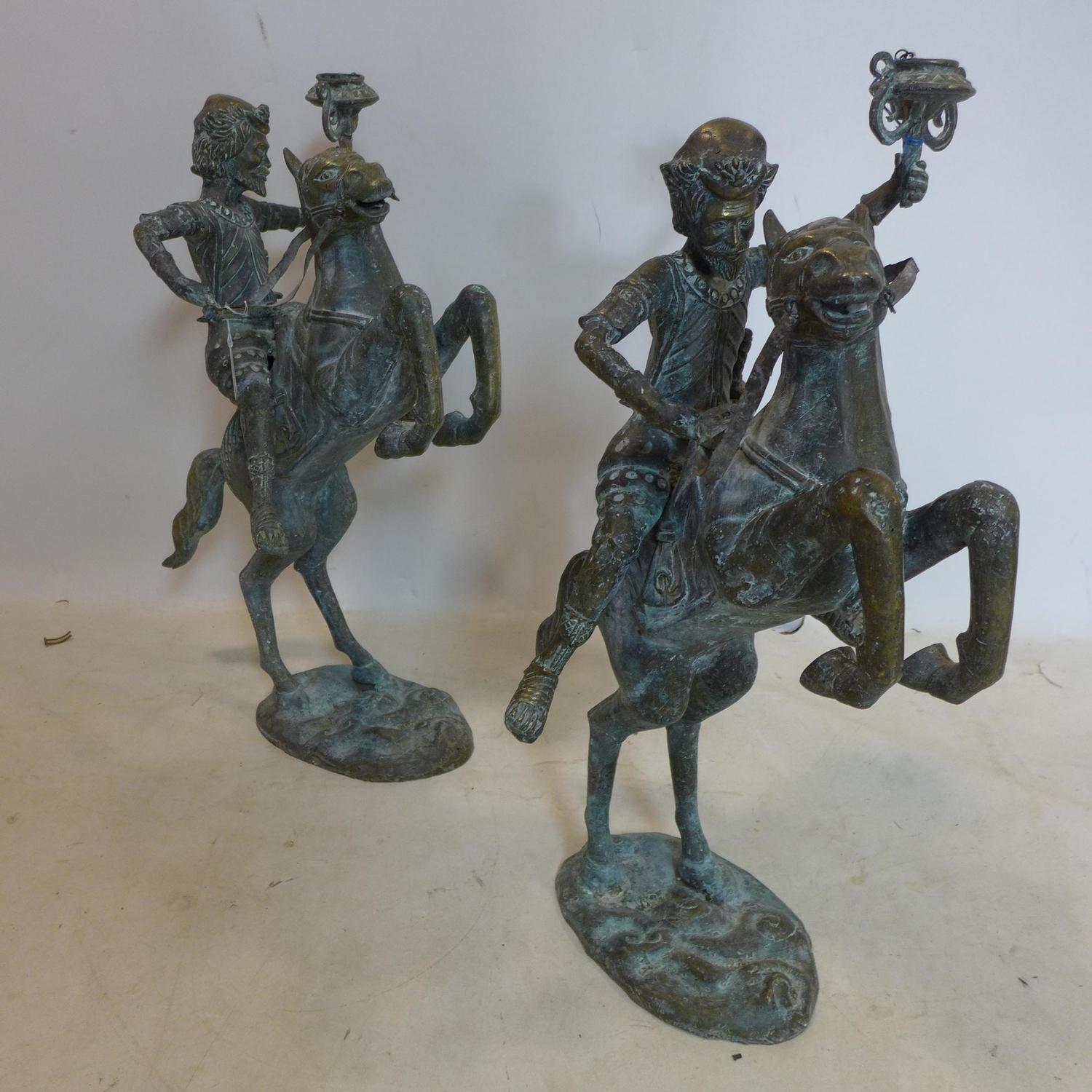 A large pair of early 20th century Dutch cast bronze candle stick holders, in the form of a figure - Image 2 of 3