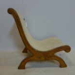 A Victorian walnut gout chair, with cream floral upholstery, H.60cm