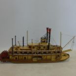 A scratch built model of a steamboat, H.29 W.65 D.15cm