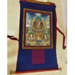 A 20th century hand painted Tibetan thangka on silk