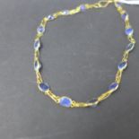 A 14ct yellow gold bracelet set with 15 oval, faceted natural sapphires, L. 18cm, 1.5g