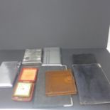 A collection of items to include: Asprey 1937 silver edged leather wallet, 935 silver-edged 1920's