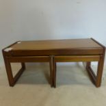 A 20th century teak 'Long John' nest of 3 tables, H.45 W.96 D.43cm