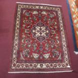 A Central Persian Isfahan rug, double pendent medallion with repeating spandrels and petal motifs on