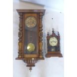A 19th century mahogany Vienna regulator wall clock together with one other clock