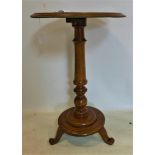 A Victorian walnut wine table, with brass beading and turned support, H.72 D.44cm