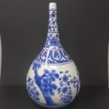 A large early 20th century Chinese baluster vase, the neck hand-painted with floral borders and