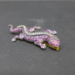 An 18ct yellow gold, silver, ruby, diamond and emerald salamander brooch, L.6.3cm W.3cm