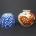 Two 19th century Chinese water pots, one hand-painted blue and white example, H. 7cm, and other