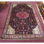 A North-West Persian Nahawand carpet, central diamond medallion with repeating animal and petal