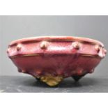 A Chinese water-pot decorated to the exterior in a deep red glaze and the interior a sky blue, H.
