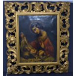 A late 19th / early 20th century oil on canvas of Mary and infant Jesus, unsigned, with hole and