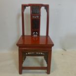 A late 19th century Chinese red lacquered chair, with side drawer