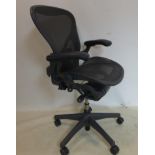 A Herman miller Aeron swivel desk chair