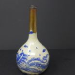 An early 20th century Chinese crackle glazed blue and white vase, decorated with phoenix, scrolls