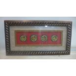 Four Chinese hard stone plaques framed as one