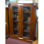 A Victorian mahogany bookcase, top plank loose, H.114 W.86 D.30cm